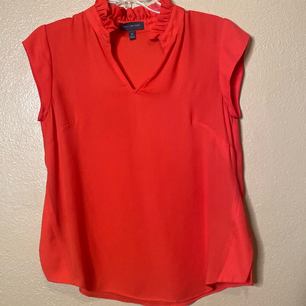 The limited top. Size PS. Melon color.